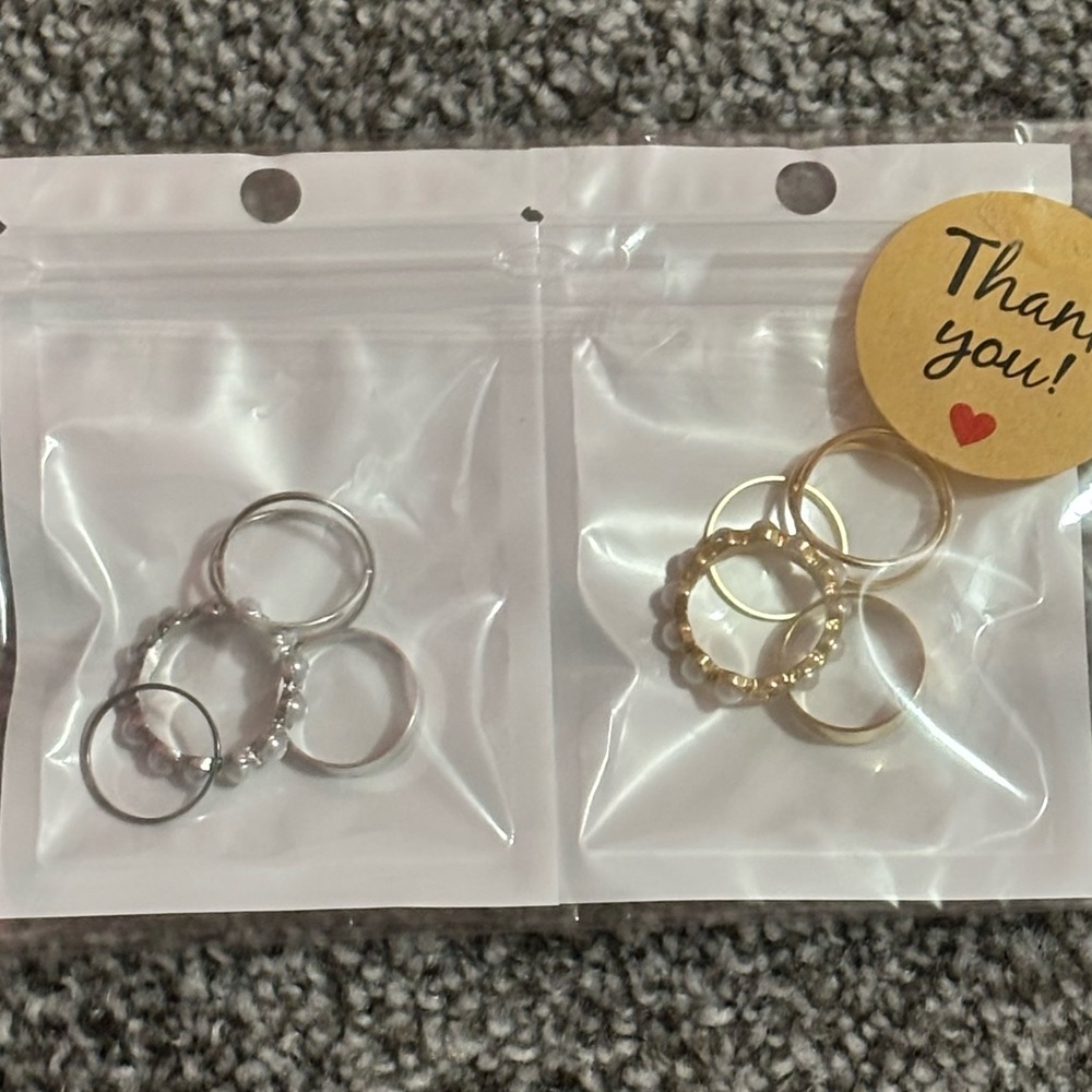 Size 8 stackable silver and gold rings set of four each